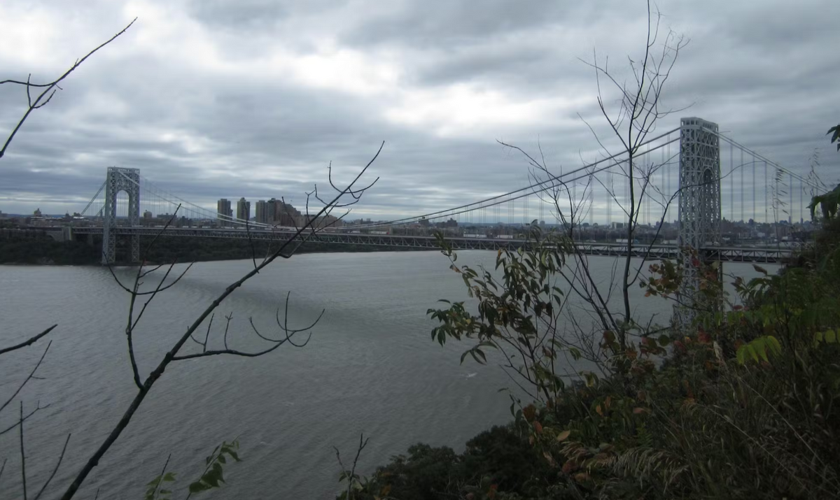 Large bridge over a river on the East Coast on an overcast day.
