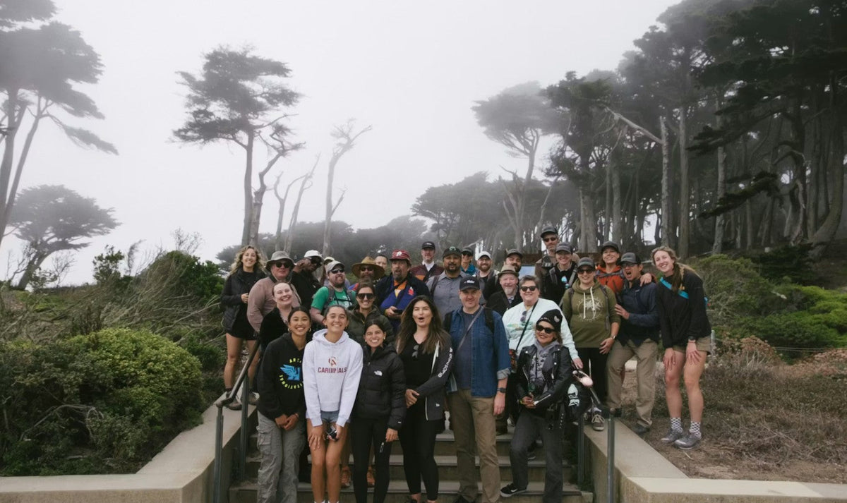 Group of photographers in front of forest park.
