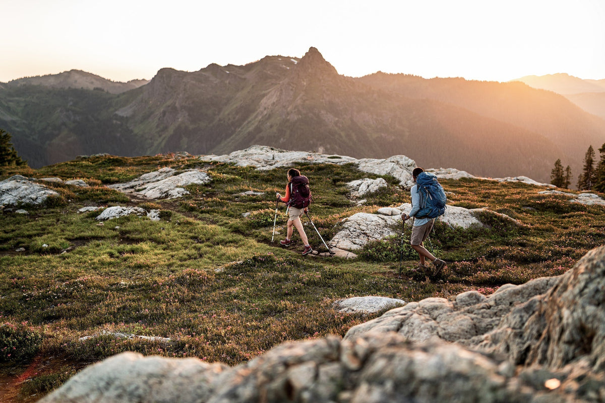 Two people hiking in Oboz Bridger boots.