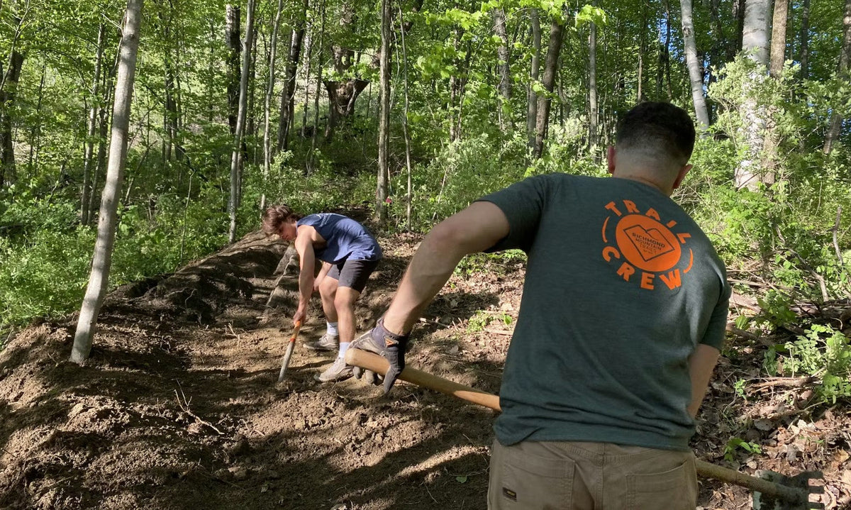 Oboz ambassadors buildng biking and hiking on Richmond Mountain Trails.