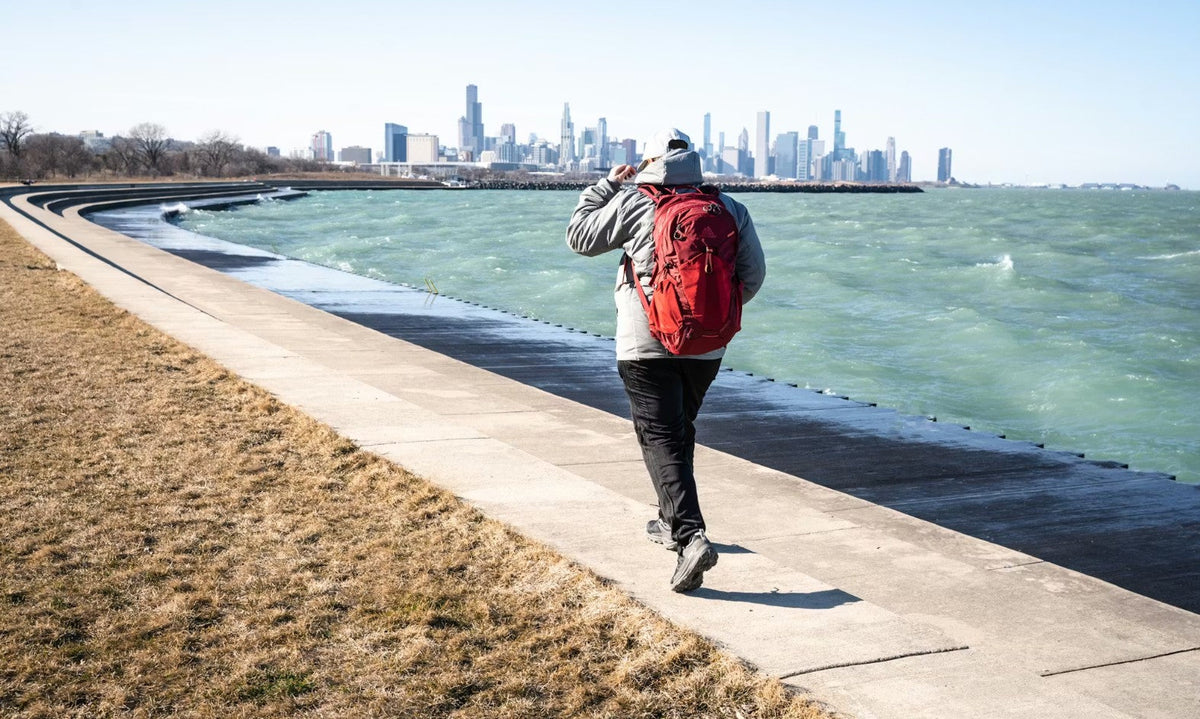 Urban adventurer hiking on a city trail in Chicago.